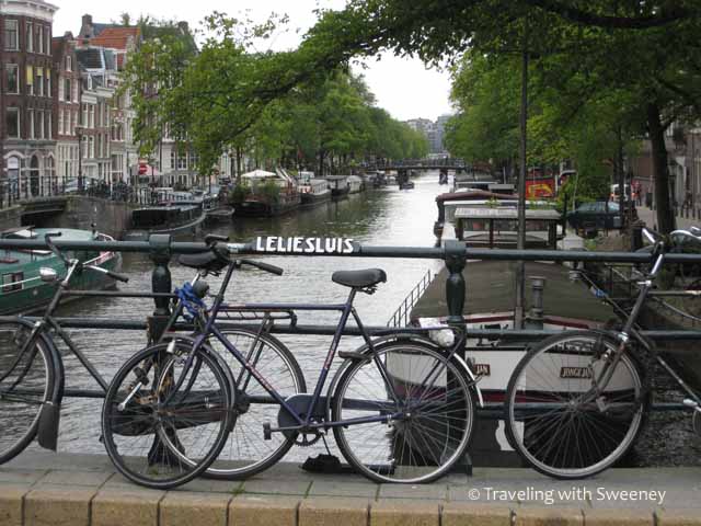 "In Amsterdam Bikes and Boats are seen everywhere"