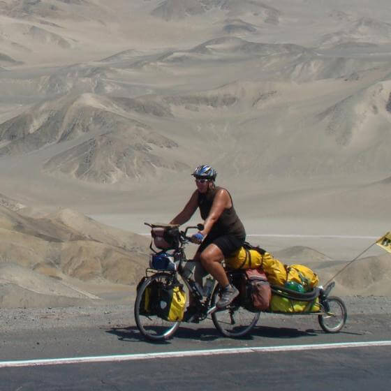 Nancy Sthre-Vogel on her bike somewhere along the Peruvian coast