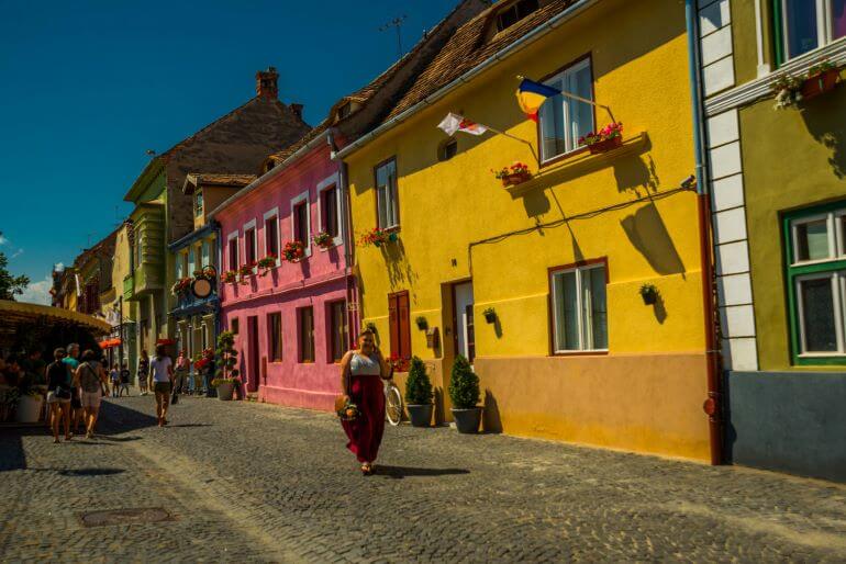 Colorful buildings in a Romanian town -- Photo by Barbara Nelson