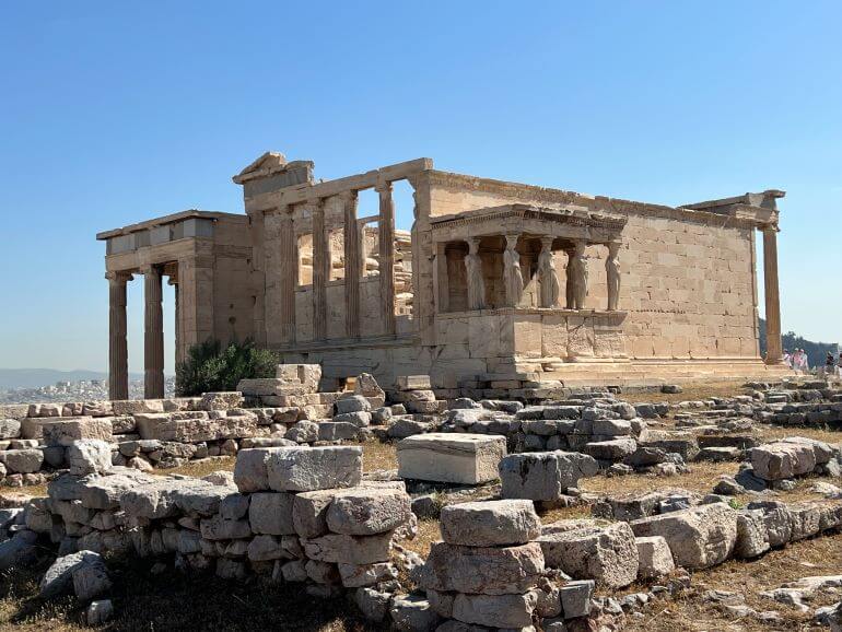 Erechtheion building of the Acropolis (Porch of the Caryatids on the right) in Athens, Greece