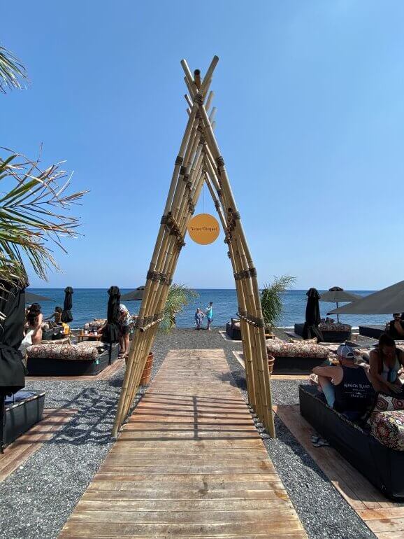 Seaside Restaurant and sunbeds at Perivolos Beach, Santorini, Greece