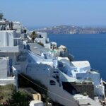 Whitewashed buildings of Santorini above the Aegean Sea, Greece