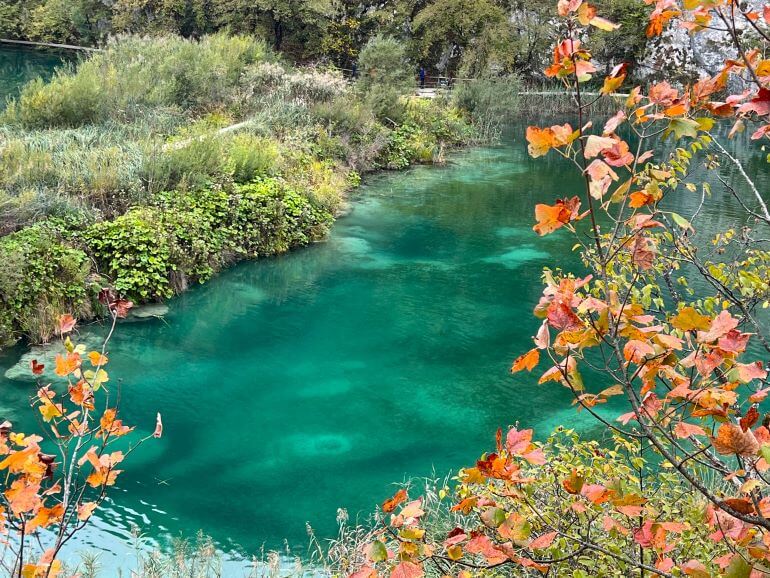 Fall foliage and emerald lakes of Plitvice Lakes National Park in Croatia