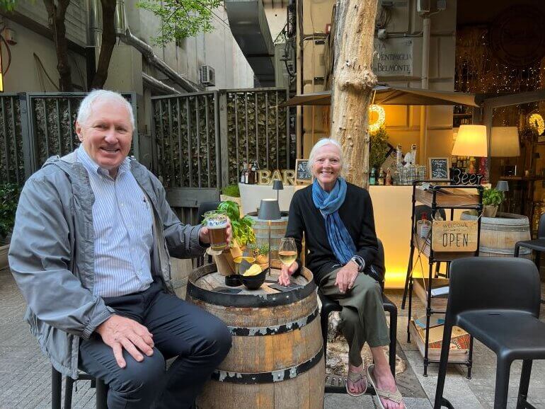 Catherine Sweeney and Mr. TWS enjoying a beveage at a bar on Via Principe di Belmonte, Palermo, Sicily, Italy