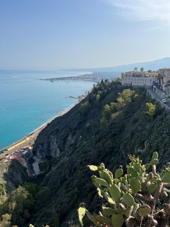 View of the Ionian coast and the Taormina - Giardini railway station below - Sicily, Italy
