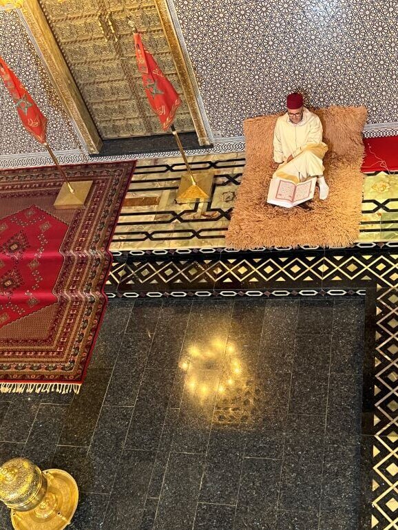 Imam praying at the Mausoleum of Mohammed V in Rabat, Morocco