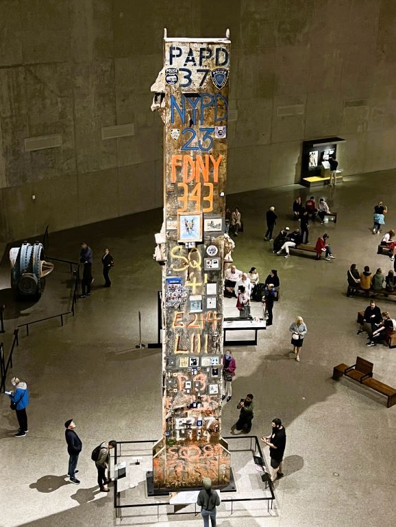 The Last Column of the World Trade Center (last piece of steel removed during the recovery) covered with markings and tributes from victim’s loved ones -- 9/11 Memorial and Museum, New York City