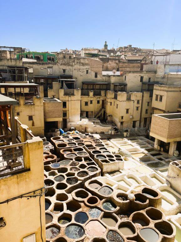 Vats of dye at leather tannery in Fes Medina, Morocco