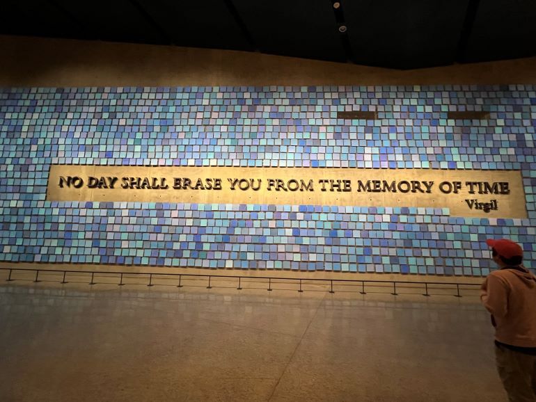 "No day shall erase you from the memory of time" quotation at 9/11 Memorial and Museum in New York City