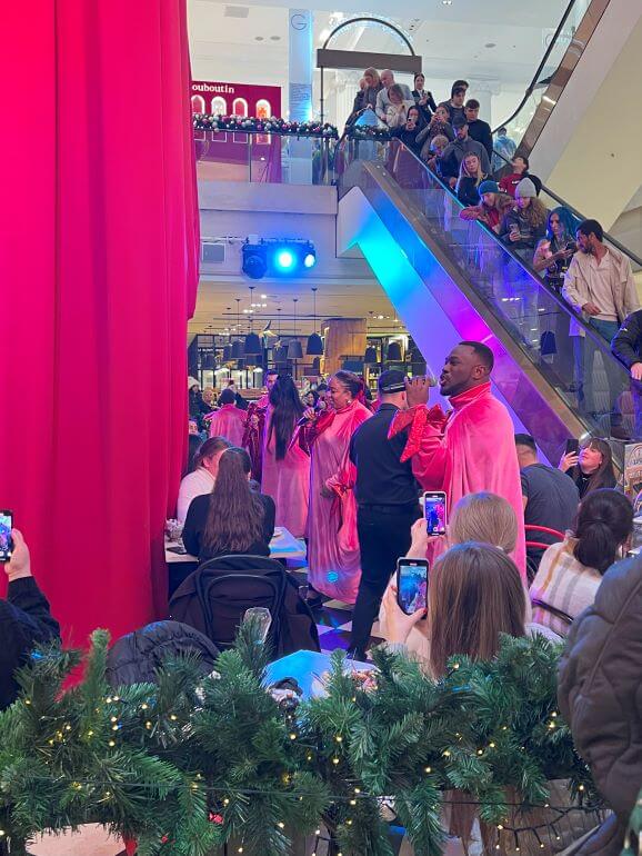 Singers entertain shoppers at Selfridges in London, England