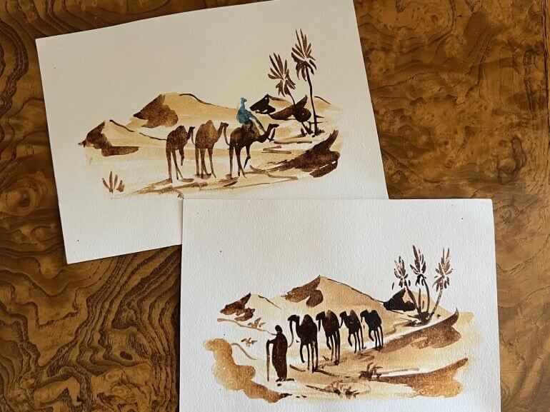 Saffron-based paintings of desert scenes by an artist in Ben Ait-Haddou, Morocco