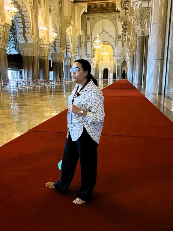 Local guide inside Hassan II Mosque in Casablanca, Morocco on a Collette guided tour