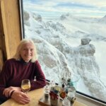 Catherine Sweeney having lunch at the Panorama Restaurant atop Mt. Titlis in Switzerland