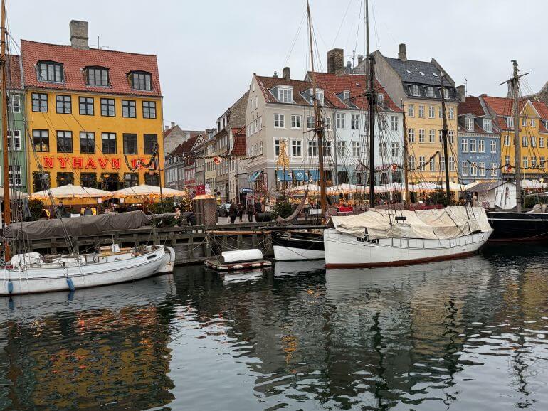 Boats on the canal in Nyhavn district of Copenhagen, Denmark