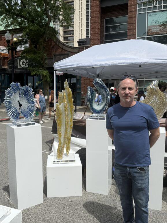 Artist with his glass sculptures in Old Town, Chicago, Illinois